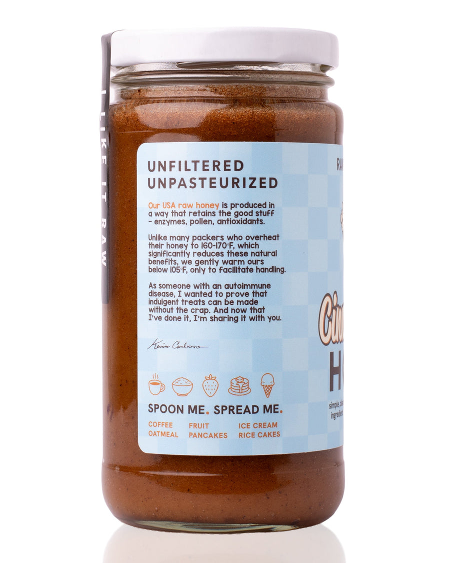 Side panel of Raw Honey Project Cinnamon Bun Honey jar. Text reads 